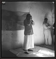 Meher Baba himself participating in the Universal and Repetance prayers with Mandali
